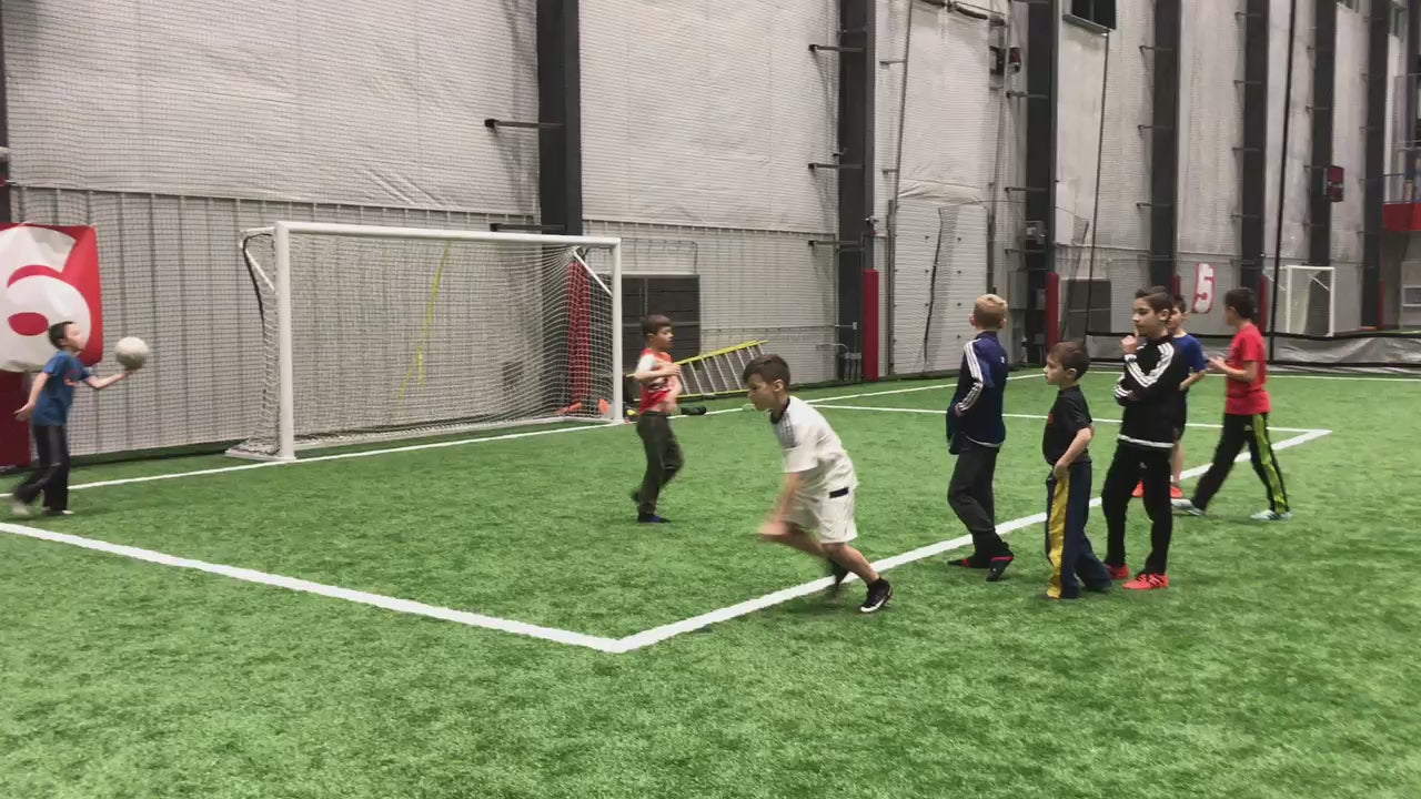 Load video: Eznet being struck at the top right-hand corner in an indoor venue, demonstrating its flexibility.